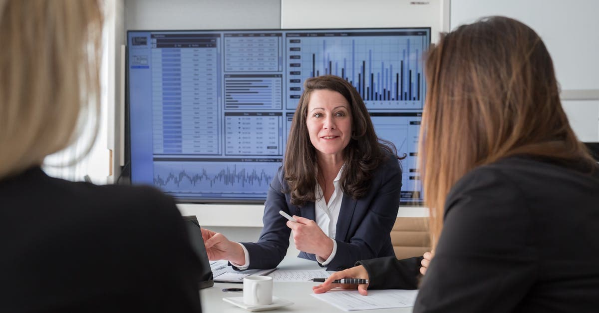 Sales director mapping platform fields on a whiteboard